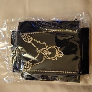 Filigree embellished necklace